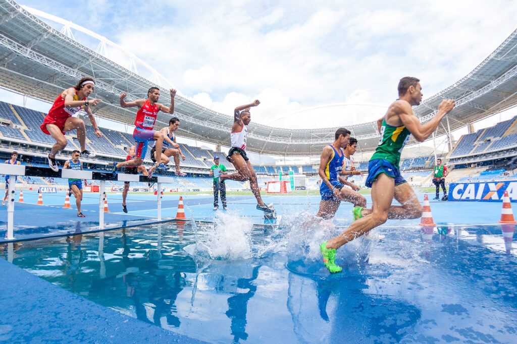 action, nature, athletes, competition, hurdles, men, people, race, running, splash, sport, stadium, track and field, water, blue water